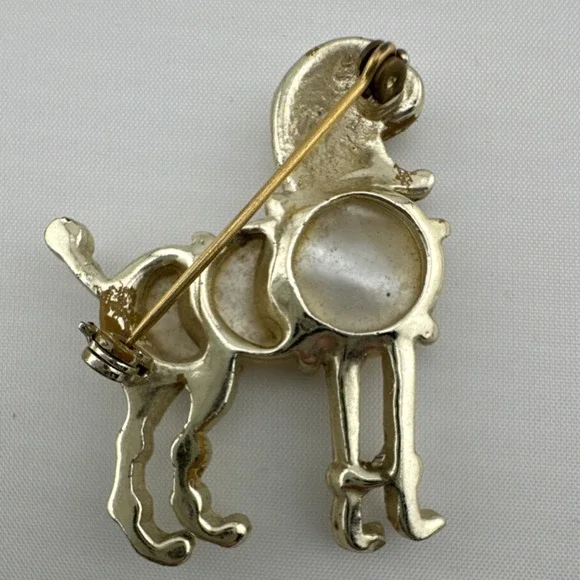 Gold Tone Poodle Shaped Brooch with Mother of Pearl, White Accents, Green Eye - Picture 2 of 3